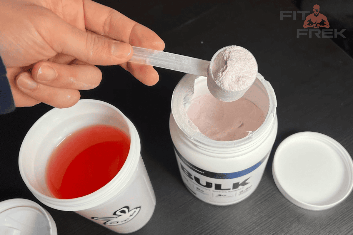 Bulk-Transparent-Labs-Pre-workout-Supplement-Top-View-Getting-a-Sccop-of-powder-from-the-container